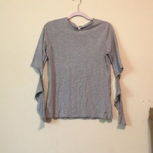 Long sleeve shirt with elbow cut outs